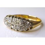 An 18ct gold twelve stone diamond ring, approximately 0.9ct overall, size P, 4g.