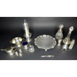 A group of silver items, comprising a sugar sifter David Hollander & Son, Birmingham 1971, a