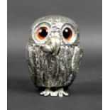 An early Victorian silver novelty mustard pot, modelled as a standing owl, inset with glass eyes,