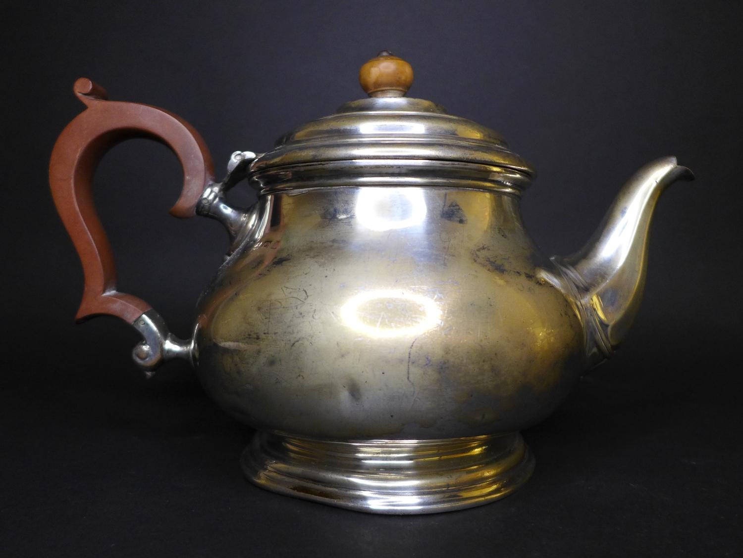 A George V silver teapot, of squat circular form, with ebonised handle and walnut finial, Adie Bros, - Image 2 of 9