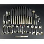 A group of Victorian and Edwardian silver flatware, mostly small spoons, including a set of six