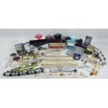 A large collection of vintage and later costume jewellery, including a Butler and Wilson 'Ruby