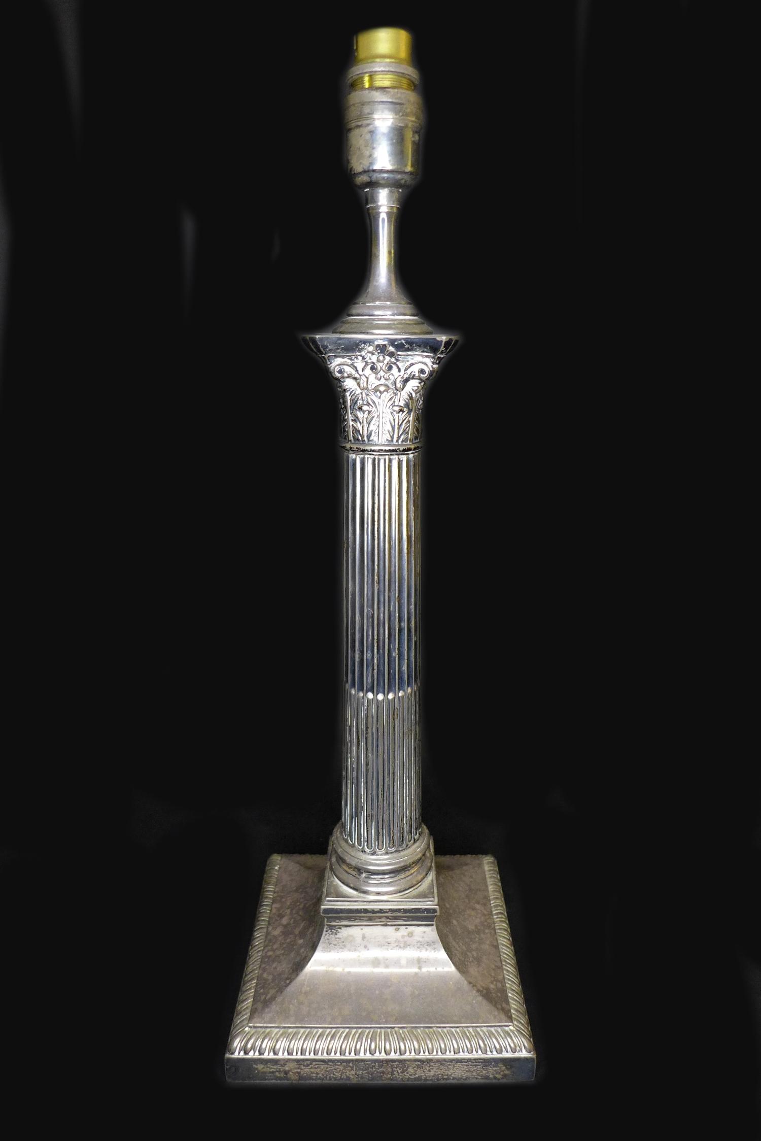 A George V silver Corinthian column form lamp base, with square form plinth, weighted base,