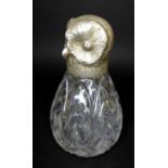 A Victorian silver novelty atomiser, modelled as an owl with chased silver head and cut glass