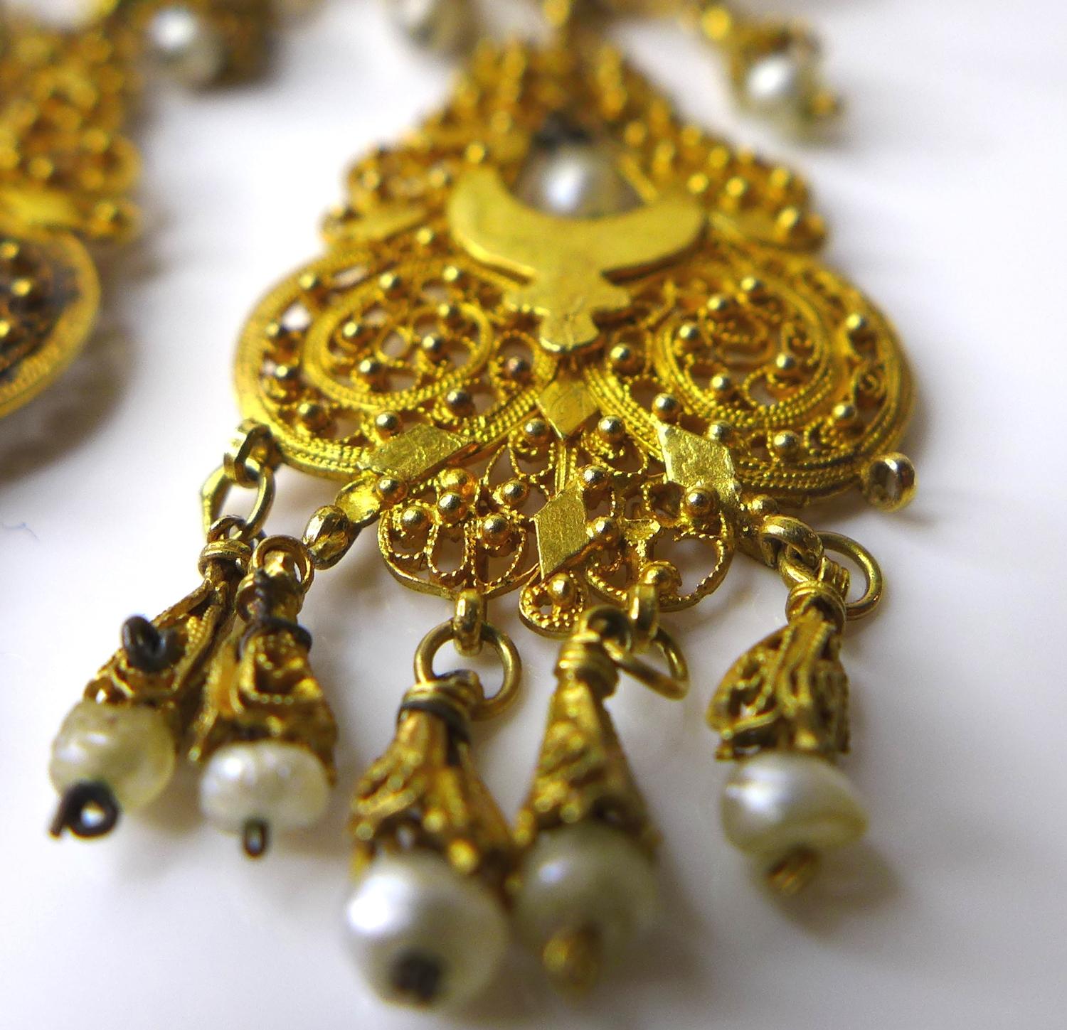 A pair of 1930s Indian 9ct gold earrings with seed pearl drops, very fine pierced decoration, each - Image 3 of 5