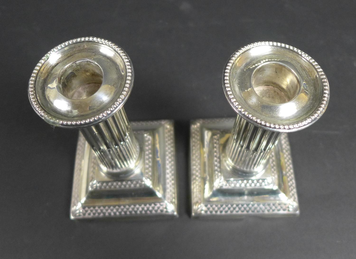 A pair of late Victorian silver dwarf candlesticks, of Roman Doric column form, with square plinths, - Image 7 of 7