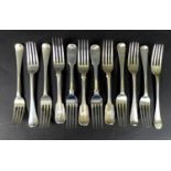 A group of Georgian and Victorian silver table forks, comprising a set of five fiddle pattern,