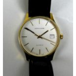 A Mappin & Webb 9ct gold cased gentleman's wristwatch, circular silvered dial with gold batons,