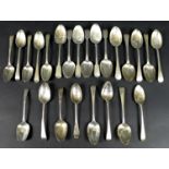 A group of Georgian and later desert spoons, mostly Hanoverian and Old English pattern, some with