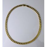 A 9ct gold flattened curb link chain necklace, 43.5cm long, 31.8g.