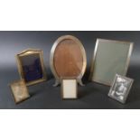 A group of six silver photograph frames, the largest of rectangular form, 23 by 17.3cm, Charles S