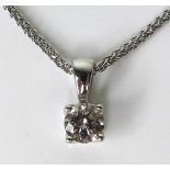 A 9ct white gold and diamond solitaire necklace, the brilliant cut stone of approximately 0.4ct,