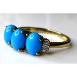 A 9ct gold three stone turquoise and diamond ring, the three oval turquoise stones each of