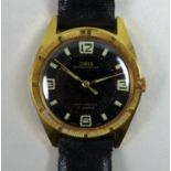 A vintage Oris gold plated gentleman's wristwatch, circular black dial, stylised Arabic cardinal