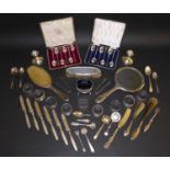 A group of Victorian and later silver wares, two cased sets of six teaspoons, including nine napkins