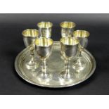Judaica: a composite set of six Edward VII silver kiddush cups, each engraved with a wreath, Jacob