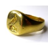 A Victorian 18ct gold signet ring, with engraved bird in hand decoration, maker D&F, Birmingham