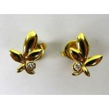 A pair of Tiffany & Co 18ct gold and diamond stud earrings of Olive Leaf design by Paloma Picasso,