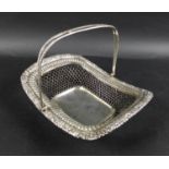 A George III silver cake basket, of rectangular form with open wirework body, applied floral