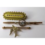 A group of three brooches, comprising a Victorian 18ct gold and pearl set brooch, of rectangular