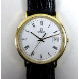 An Omega 18k gold cased gentleman's wristwatch, ref 1061, circular white dial with black Roman
