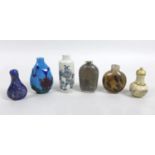 A group of six Chinese snuff bottles, comprising a 19th century cylindrical porcelain example with