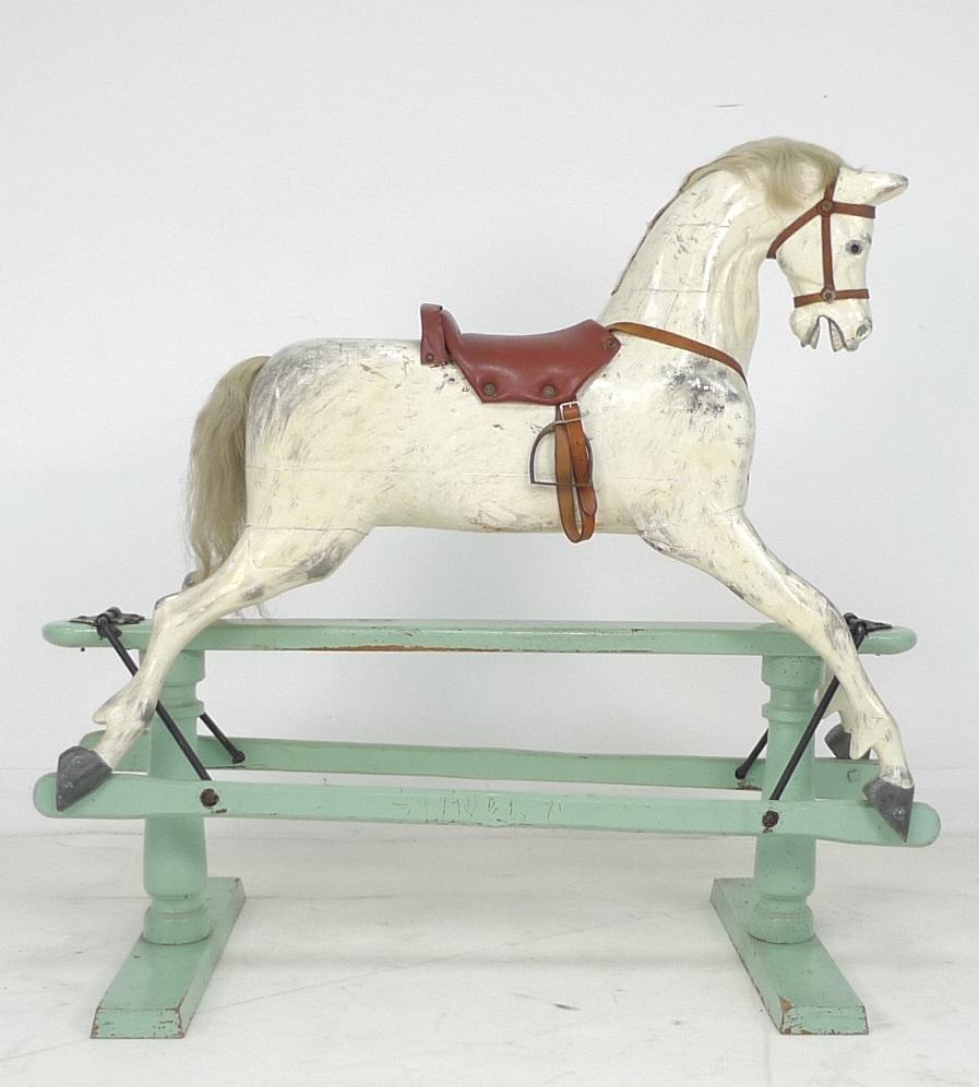 An Edwardian G & J Lines extra carved rocking horse, painted dapple grey horse with brown leather - Image 2 of 5