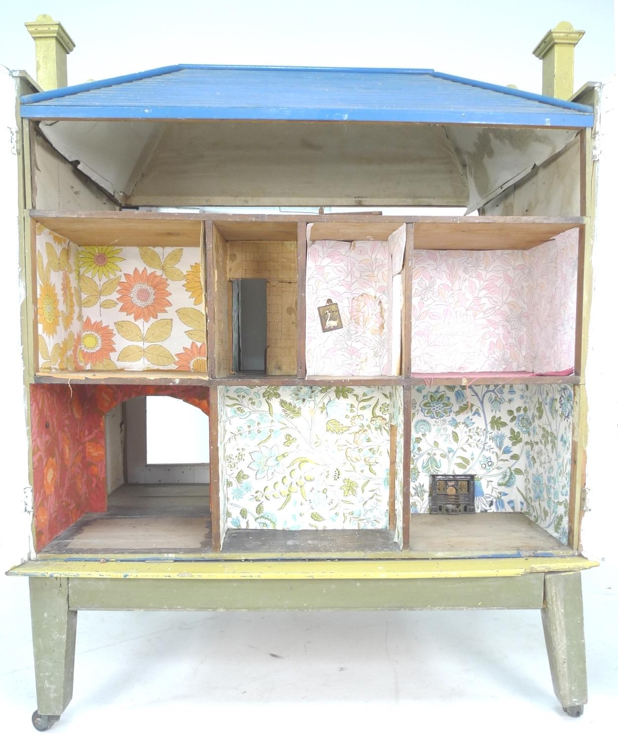 A 19th century Georgian Manor style Dolls house, with three storeys, accessible from both front - Image 3 of 3
