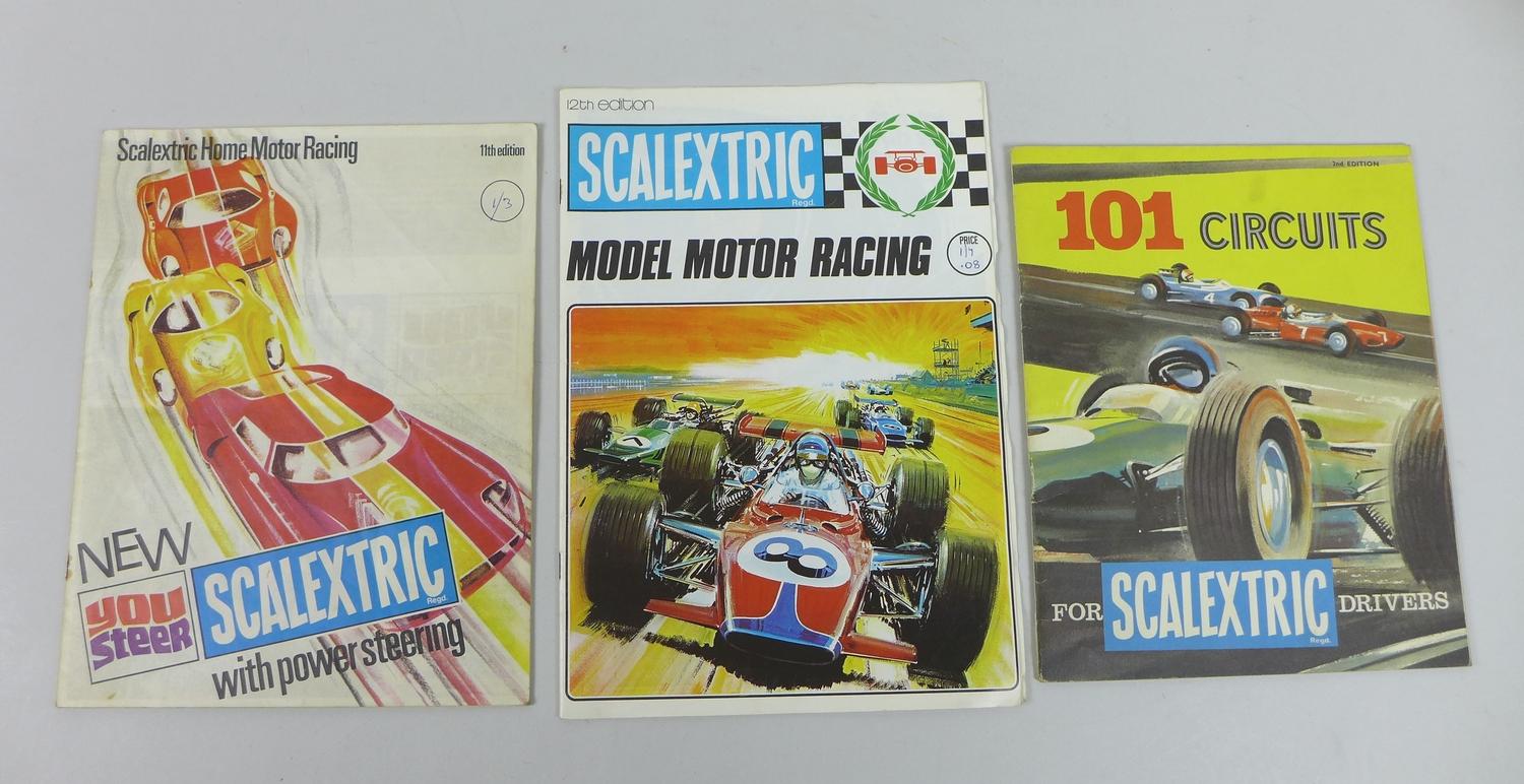 A vintage Scalextric racing set 12E and accessories, with original box including two racing cars, - Image 4 of 6