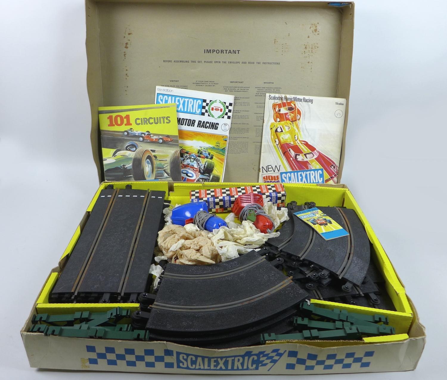 A vintage Scalextric racing set 12E and accessories, with original box including two racing cars, - Image 2 of 6