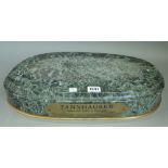 A Victorian oval green marble plinth with applied titled brass plaque 'Tannhauser- Chalon',