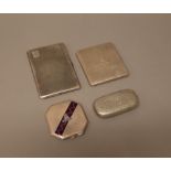 Silver, comprising; a rectangular cigarette case with engine turned decoration, Birmingham 1961,