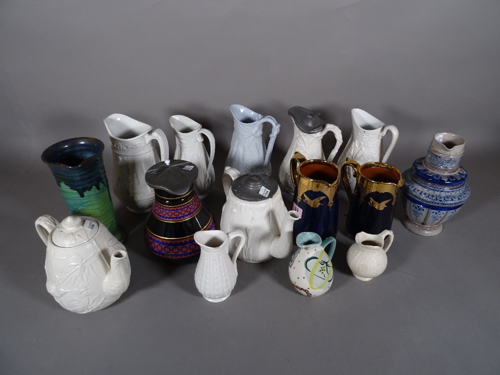 Ceramics; a quantity of Victorian and later ceramic jugs of various designs.