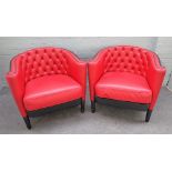 MOROSO; a pair of 20th century red and black leather upholstered tub back Rich Capitoné armchairs,