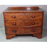 An early 19th century mahogany chest of three long graduated drawers, 108cm wide x 88cm high.