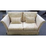 A 20th century square back sofa, with pattern floral upholstery, 180cm wide x 78cm high.