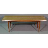 Gordon Russell; a 20th century teak rectangular coffee table, on tapering supports,