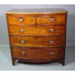 A Regency mahogany bowfront chest of two short and three long drawers, 102cm wide x 102cm high.