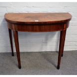 A George III kingwood banded mahogany semi-elliptic card table, on tapering square supports,