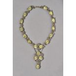 A silver mounted foil backed yellow paste and marcasite set necklace,