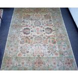 A modern Egyptian carpet, the ivory field with an allover bold palmette and flower design,