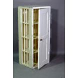 A 20th century white painted shoe cupboard, 43cm wide x 102cm high.