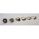 A 9ct gold and diamond set six stone ring,