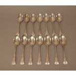 Fourteen silver double struck King's pattern tablespoons, comprising; two London 1820,