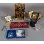 A Zenith travelling alarm clock, with a folding case, a Looping alarm clock,