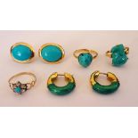 A gold ring, claw set with a turquoise matrix detailed 18CT,