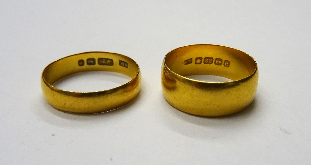 A 22ct gold wide band wedding ring, Birmingham 1904,