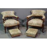 A pair of Victorian mahogany framed low tub chairs and matching footstools, (4).