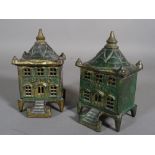 A pair of early 20th century cast iron money boxes, formed as buildings of banks, 8cm x 14cm,