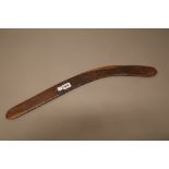 An Australian Aboriginal hardwood boomerang of typical form, 61cm.